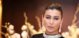 نادين الراسي إلى منتقديها: ما تزايدو على وطنيتي!